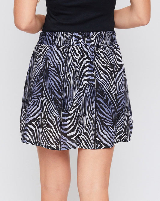 Back view of zebra print skort showing flow and fit