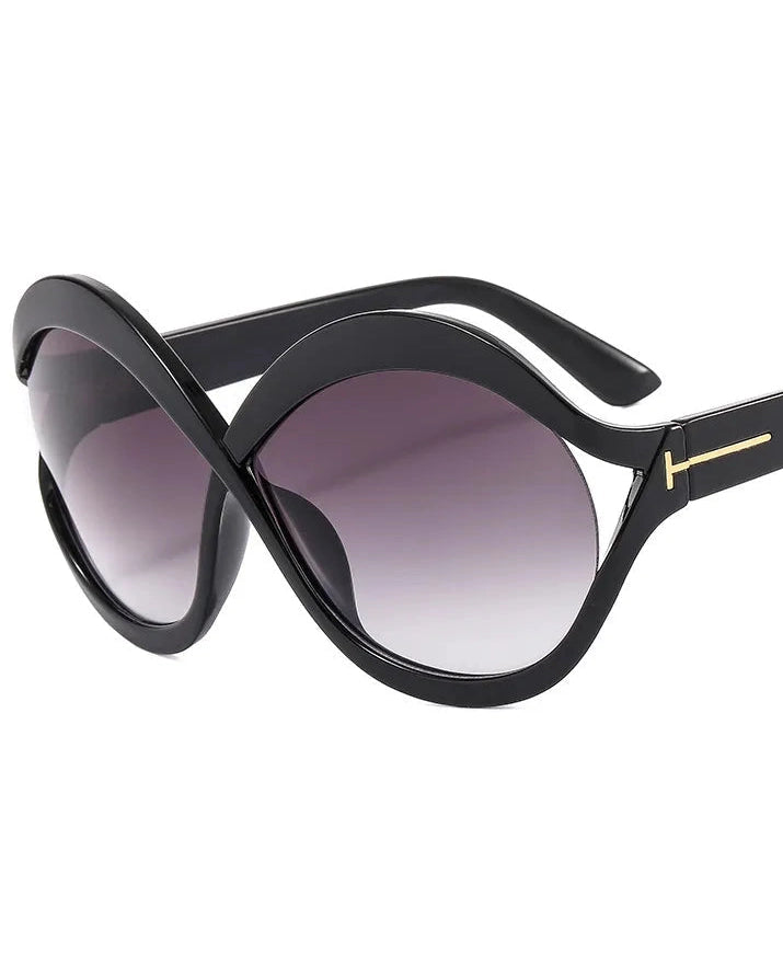 Black sunglasses with gradient lenses on a white background