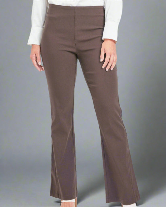 Pull-on dress pants styled with white heels and blouse