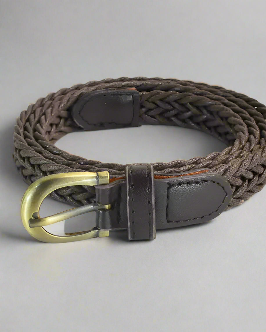 Woven belt on table with antique buckle
