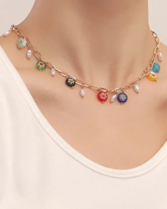 Gold link chain necklace with colorful beads and pearls