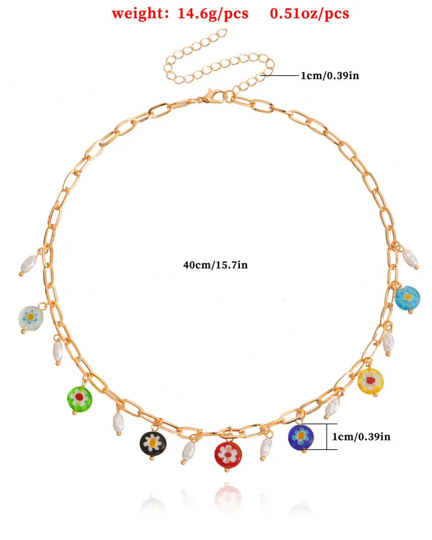 Multicolor flower and pearl charm necklace on gold chain with clasp