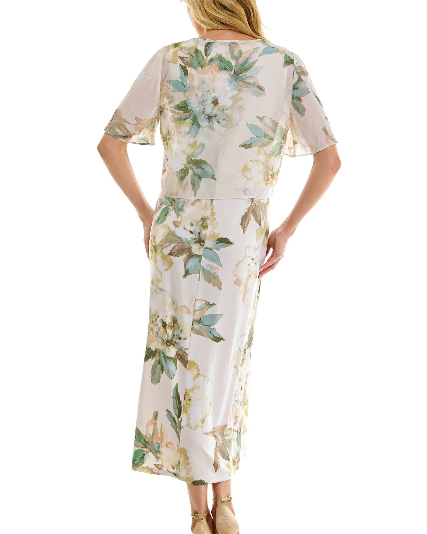 Woman wearing a floral dress on a white background