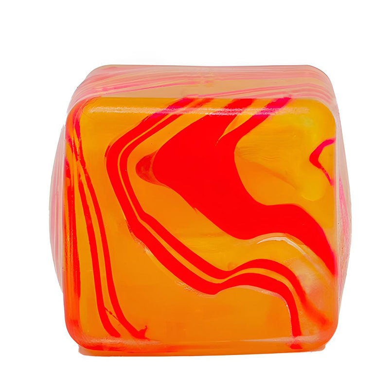 Marbled cube with orange and red patterns on a white background