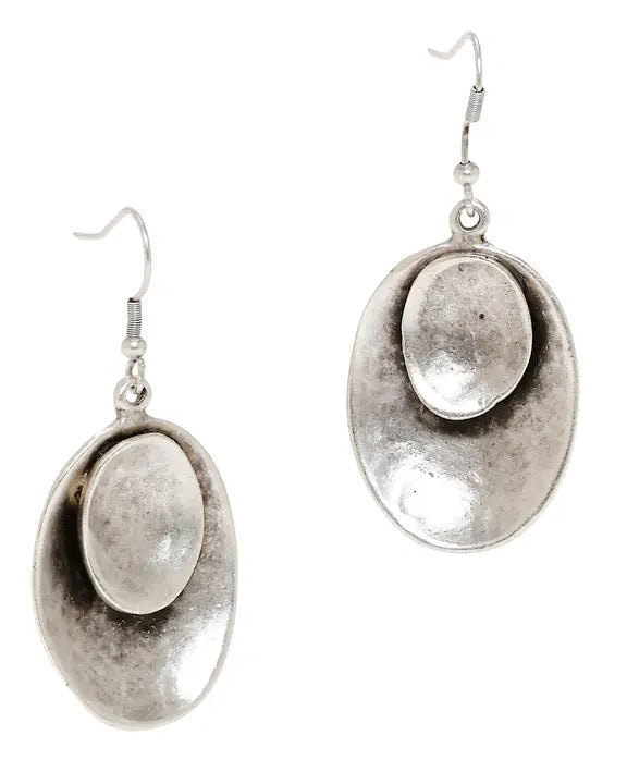 Pair of silver earrings on a white background