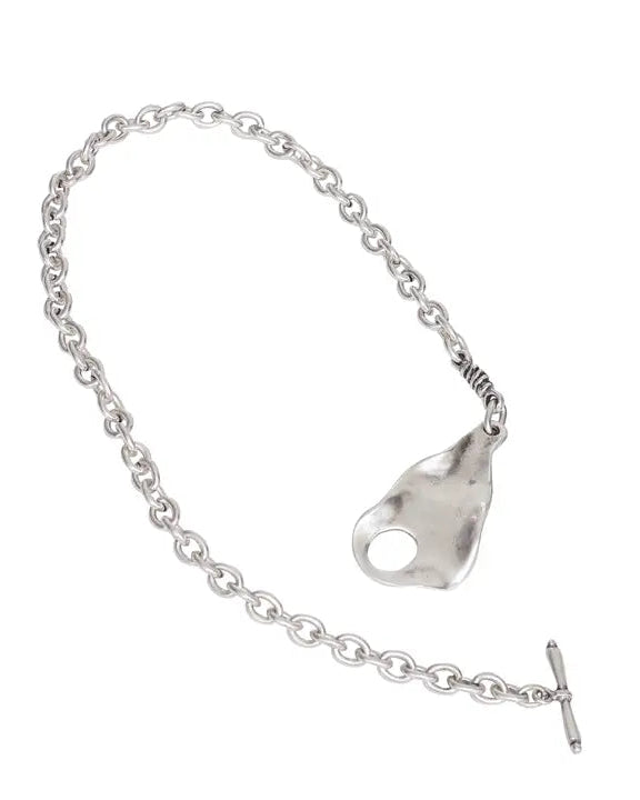 Silver necklace with a unique clasp on a white background