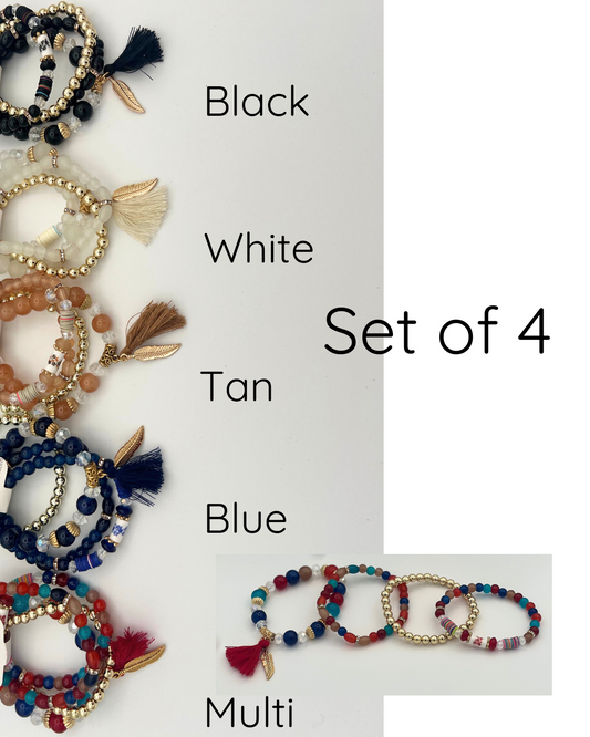 Stretch Bracelet sets of 4. Feather and tassel charm.  