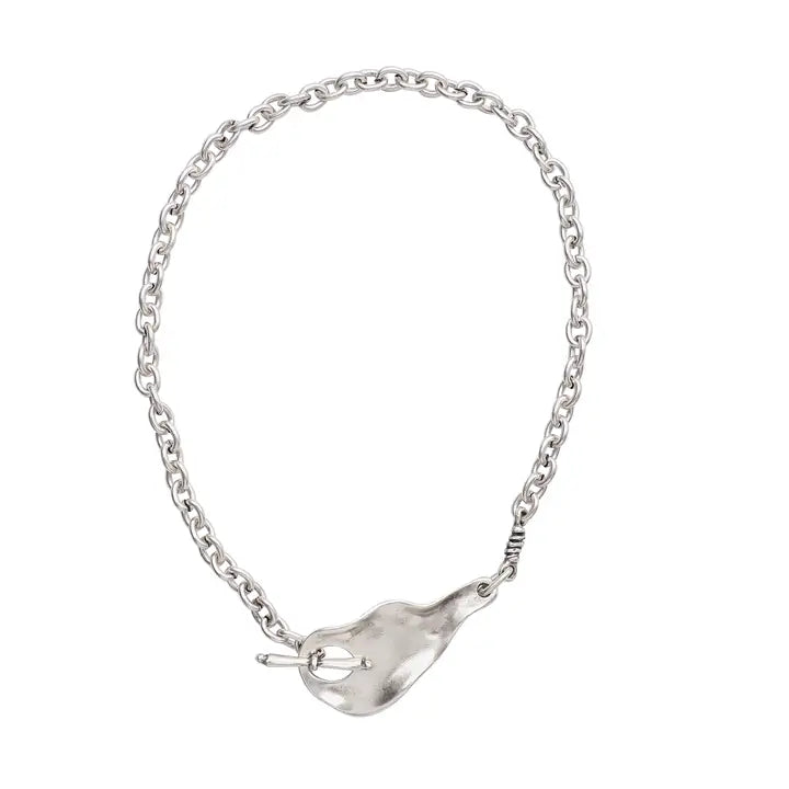 Silver chain necklace with a unique clasp on a white background