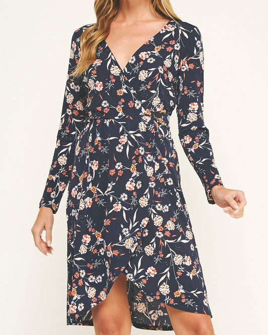 Woman wearing a floral dress on a white background