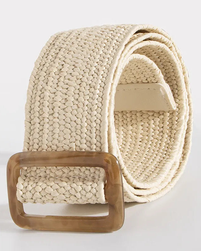 Beige woven belt with a wooden buckle on a light gray background