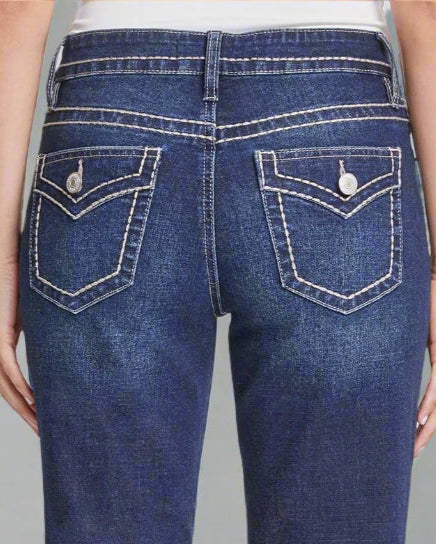 back view of pockets on bootcut mid-rise denim
