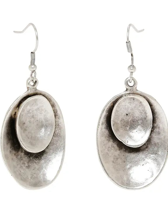 Pair of silver earrings on a white background