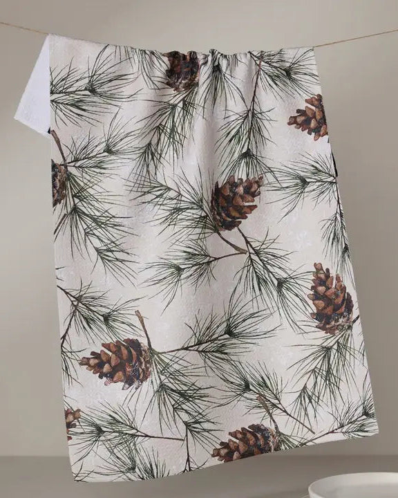 Fabric with pine cone and branch pattern on a beige background