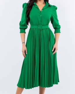 Woman wearing a green dress on a white background