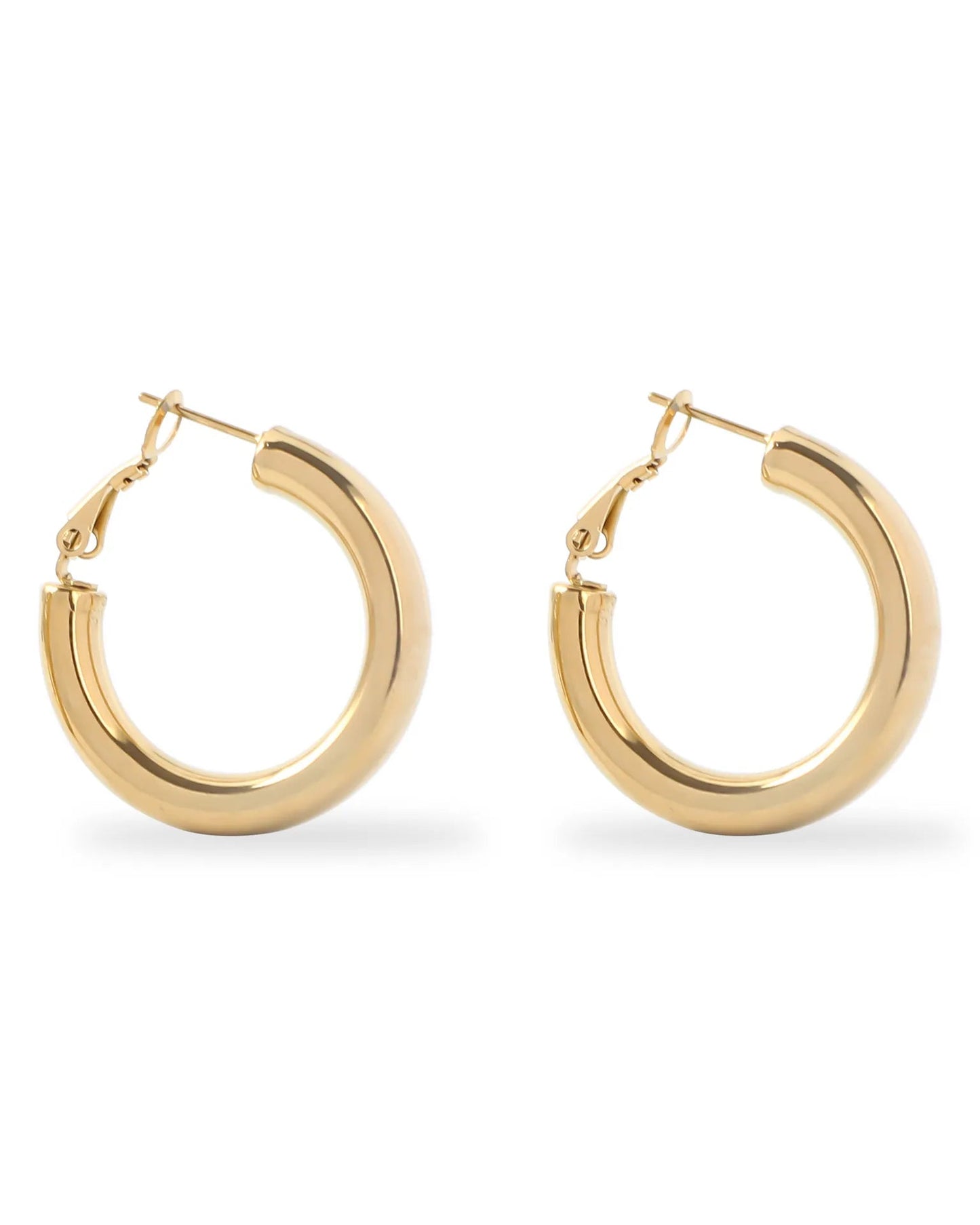 Gold hoop earrings on a white background
