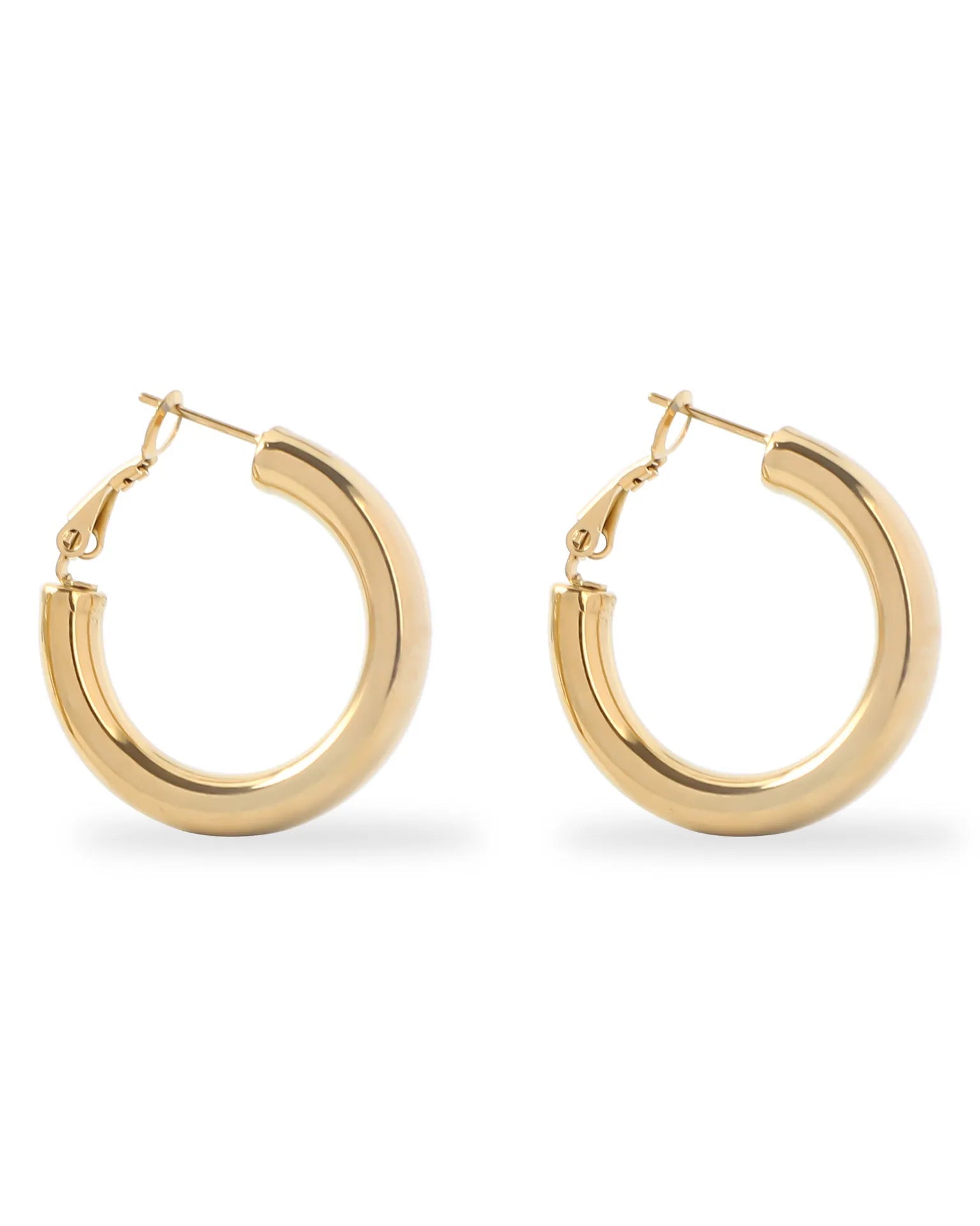 Gold hoop earrings on a white background