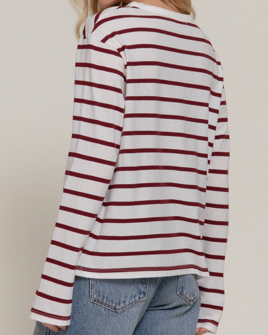 side view girl in striped shirt