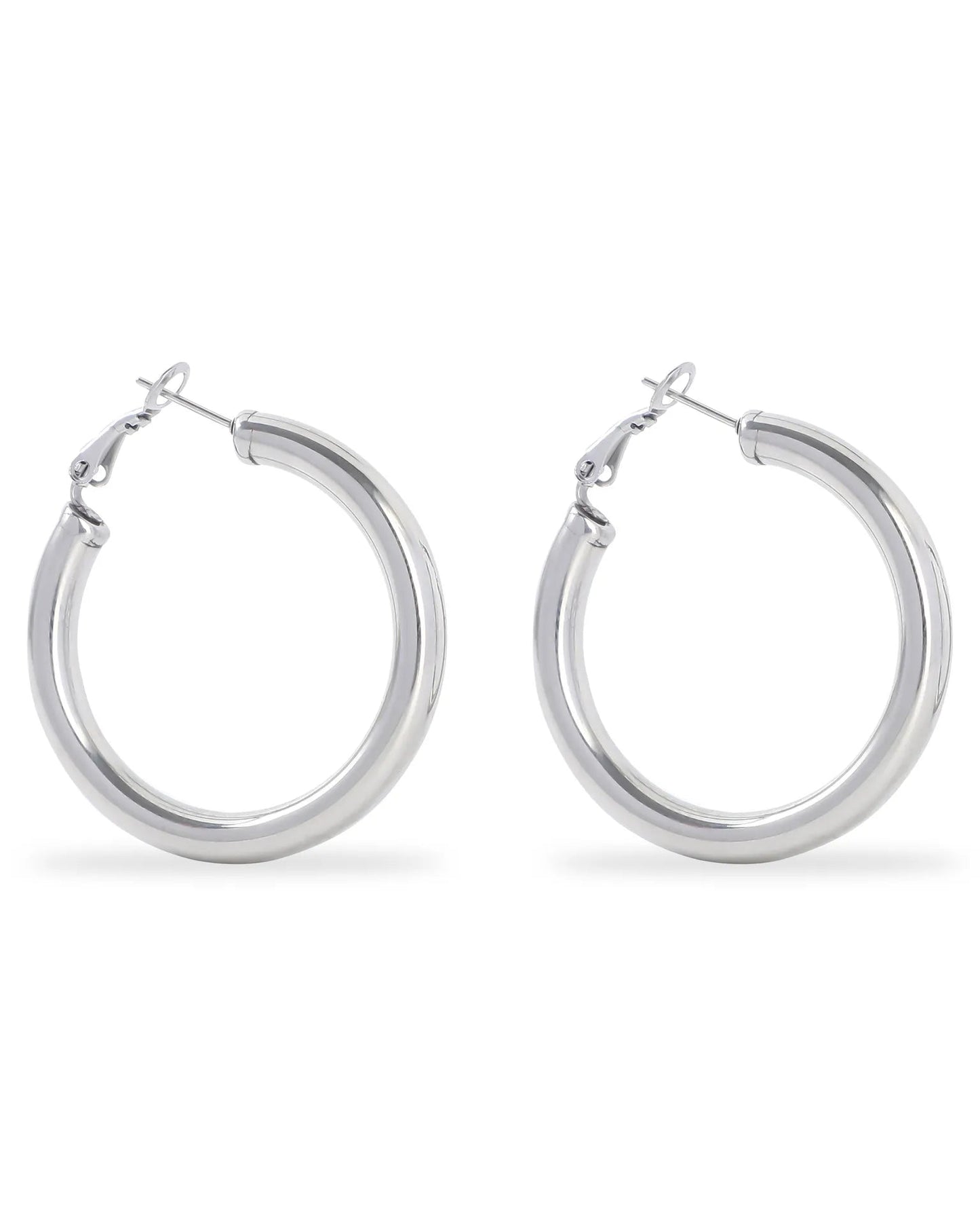 Pair of silver hoop earrings on a white background