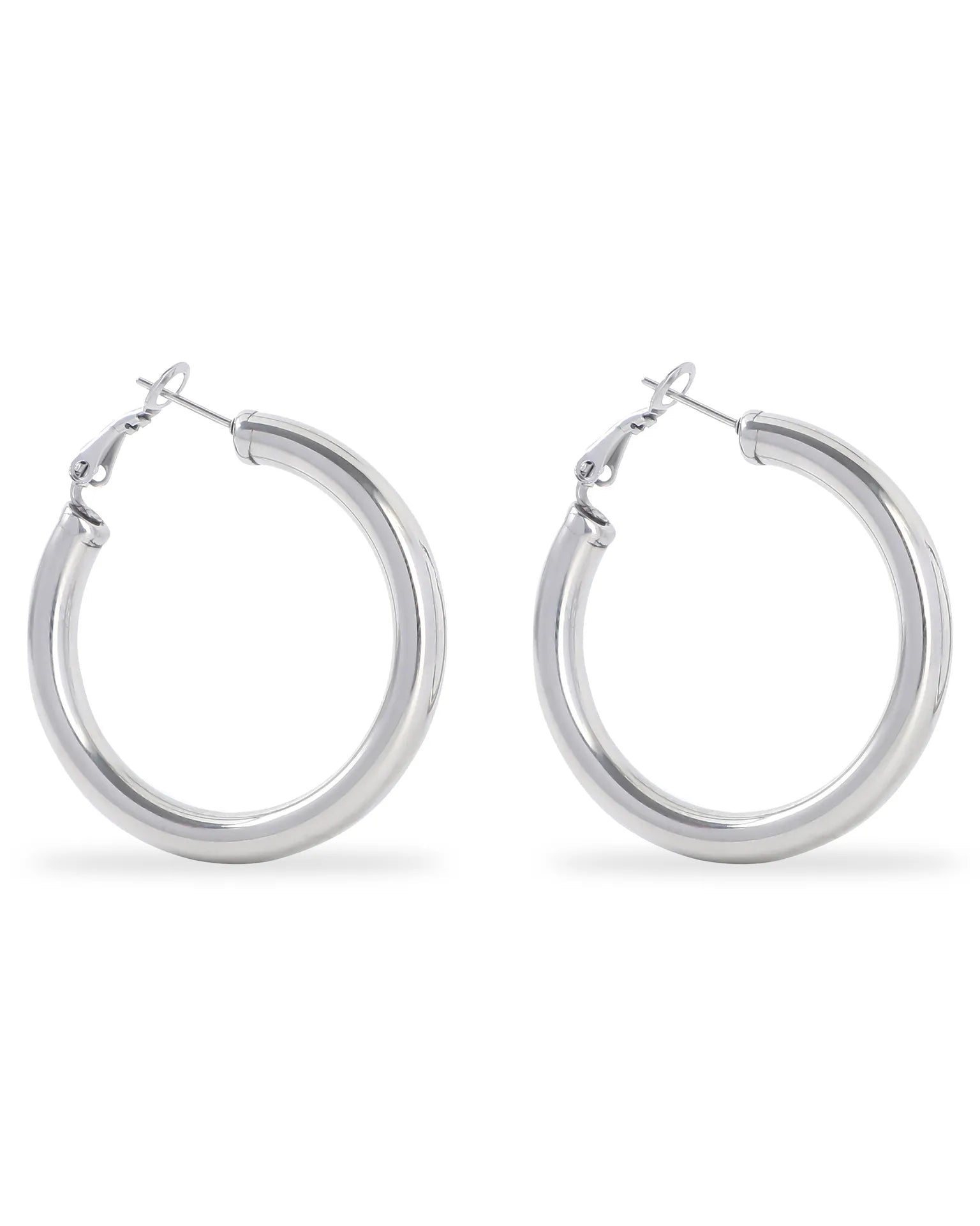 Pair of silver hoop earrings on a white background