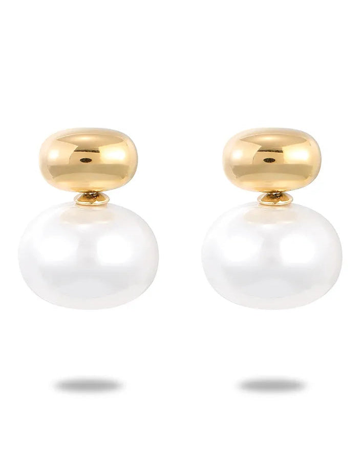 Pair of pearl earrings with gold tops on a white background